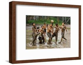 Playing Football-Angela Muliani Hartojo-Framed Photographic Print