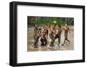 Playing Football-Angela Muliani Hartojo-Framed Photographic Print