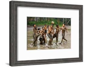 Playing Football-Angela Muliani Hartojo-Framed Photographic Print