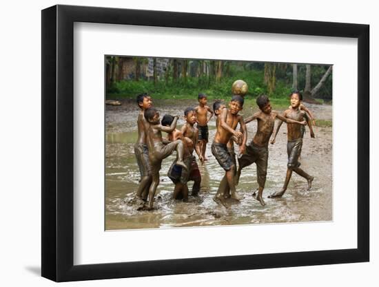 Playing Football-Angela Muliani Hartojo-Framed Photographic Print