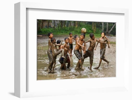 Playing Football-Angela Muliani Hartojo-Framed Photographic Print