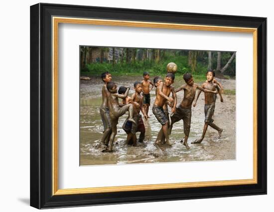 Playing Football-Angela Muliani Hartojo-Framed Photographic Print