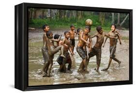Playing Football-Angela Muliani Hartojo-Framed Premier Image Canvas