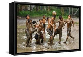 Playing Football-Angela Muliani Hartojo-Framed Premier Image Canvas