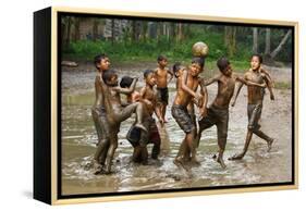 Playing Football-Angela Muliani Hartojo-Framed Premier Image Canvas