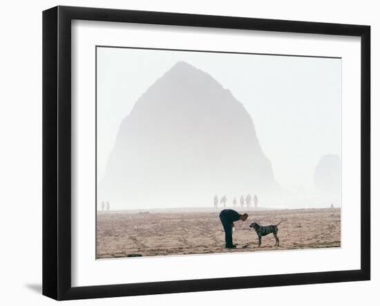 Playing Frisbee on Misty Morning, Cannon Beach, Oregon, USA-Janis Miglavs-Framed Photographic Print