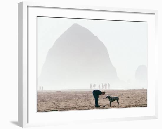 Playing Frisbee on Misty Morning, Cannon Beach, Oregon, USA-Janis Miglavs-Framed Photographic Print