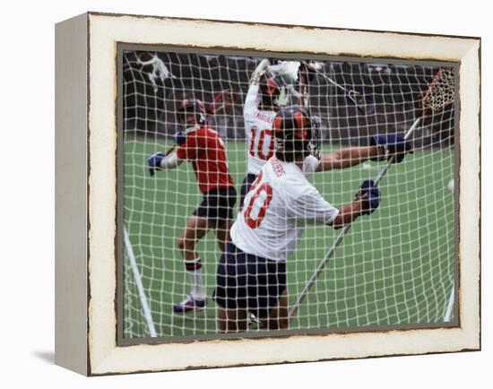 Playing Lacrosse-null-Framed Premier Image Canvas