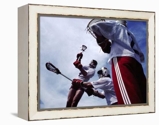 Playing Lacrosse-null-Framed Premier Image Canvas
