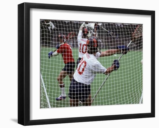 Playing Lacrosse-null-Framed Photographic Print