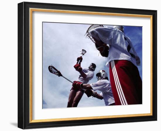 Playing Lacrosse-null-Framed Photographic Print