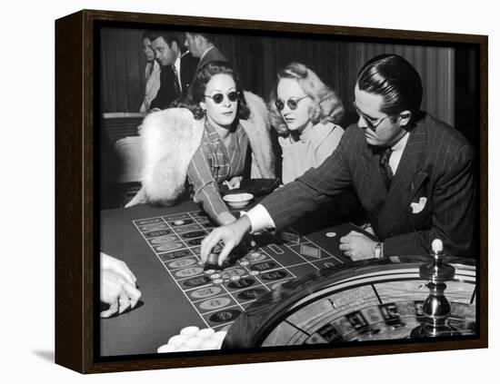 Playing the Roulette Wheel in a Las Vegas Club-Peter Stackpole-Framed Premier Image Canvas