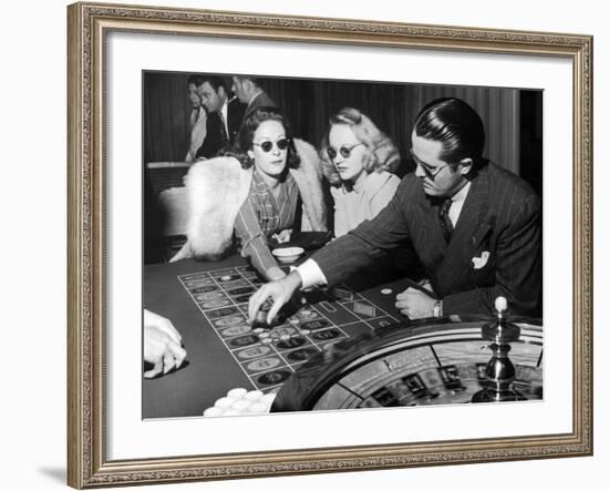 Playing the Roulette Wheel in a Las Vegas Club-Peter Stackpole-Framed Photographic Print