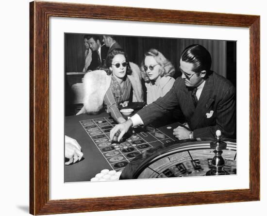 Playing the Roulette Wheel in a Las Vegas Club-Peter Stackpole-Framed Photographic Print