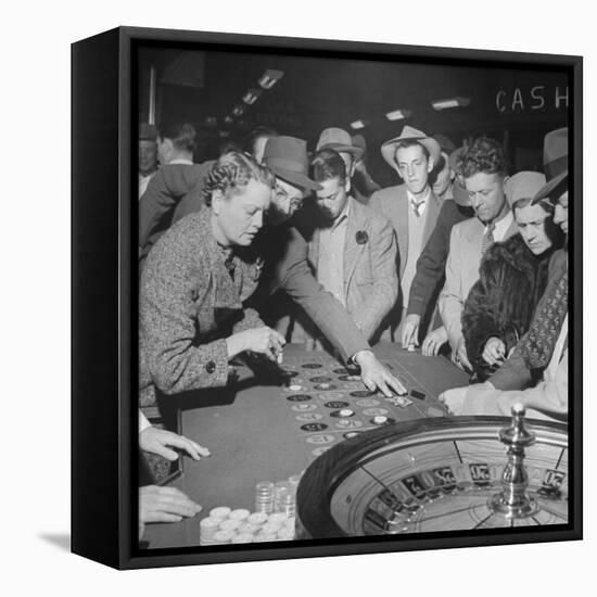 Playing the Roulette Wheel in a Las Vegas Club-Peter Stackpole-Framed Premier Image Canvas