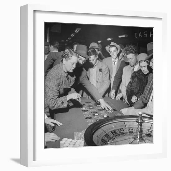 Playing the Roulette Wheel in a Las Vegas Club-Peter Stackpole-Framed Photographic Print