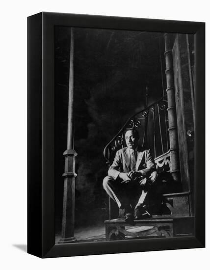 Playwright Tennessee Williams Sitting on Theater Set of His Play "Streetcar Named Desire"-Eliot Elisofon-Framed Premier Image Canvas