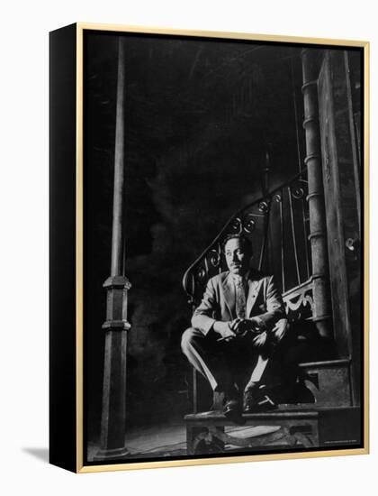 Playwright Tennessee Williams Sitting on Theater Set of His Play "Streetcar Named Desire"-Eliot Elisofon-Framed Premier Image Canvas