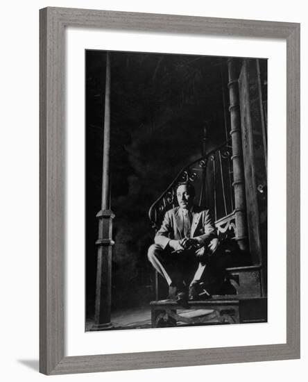 Playwright Tennessee Williams Sitting on Theater Set of His Play "Streetcar Named Desire"-Eliot Elisofon-Framed Premium Photographic Print