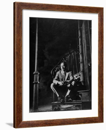 Playwright Tennessee Williams Sitting on Theater Set of His Play "Streetcar Named Desire"-Eliot Elisofon-Framed Premium Photographic Print