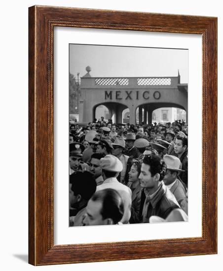 Pleased Throng Watching Willam E. Cook Jr.'s Extradition at Tijuana-Allan Grant-Framed Photographic Print