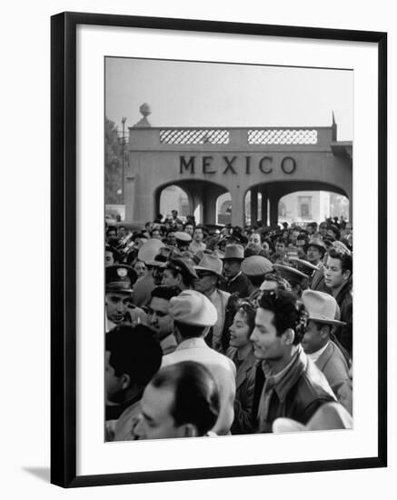 Pleased Throng Watching Willam E. Cook Jr.'s Extradition at Tijuana-Allan Grant-Framed Photographic Print