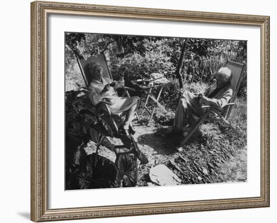 Poet Ezra Pound with Lover Olga Rudge, Chatting in Lounge Chairs Next to Breakfast Food in Garden-David Lees-Framed Premium Photographic Print