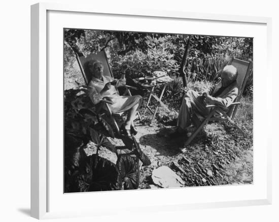 Poet Ezra Pound with Lover Olga Rudge, Chatting in Lounge Chairs Next to Breakfast Food in Garden-David Lees-Framed Premium Photographic Print