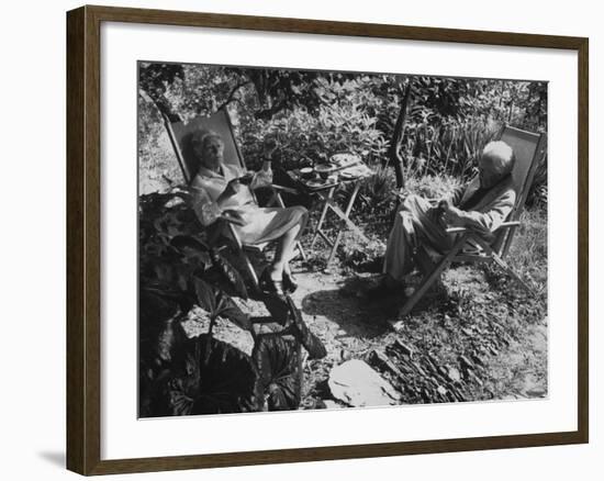 Poet Ezra Pound with Lover Olga Rudge, Chatting in Lounge Chairs Next to Breakfast Food in Garden-David Lees-Framed Premium Photographic Print