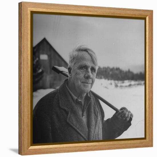 Poet Robert Frost in Affable Portrait, Axe Slung over Shoulder in Wintry Rural Setting-Eric Schaal-Framed Premier Image Canvas