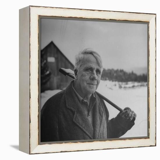 Poet Robert Frost in Affable Portrait, Axe Slung over Shoulder in Wintry Rural Setting-Eric Schaal-Framed Premier Image Canvas