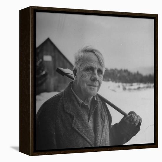 Poet Robert Frost in Affable Portrait, Axe Slung over Shoulder in Wintry Rural Setting-Eric Schaal-Framed Premier Image Canvas