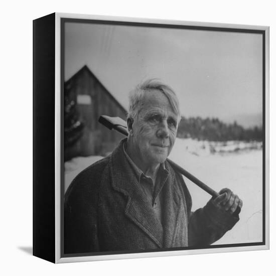 Poet Robert Frost in Affable Portrait, Axe Slung over Shoulder in Wintry Rural Setting-Eric Schaal-Framed Premier Image Canvas