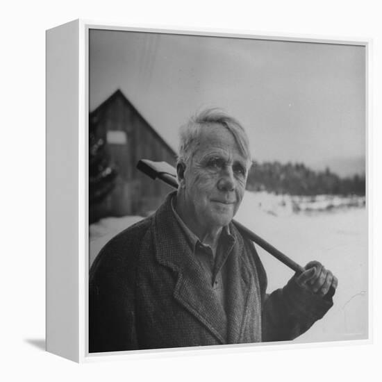 Poet Robert Frost in Affable Portrait, Axe Slung over Shoulder in Wintry Rural Setting-Eric Schaal-Framed Premier Image Canvas