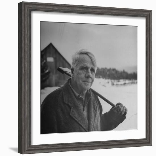 Poet Robert Frost in Affable Portrait, Axe Slung over Shoulder in Wintry Rural Setting-Eric Schaal-Framed Premium Photographic Print