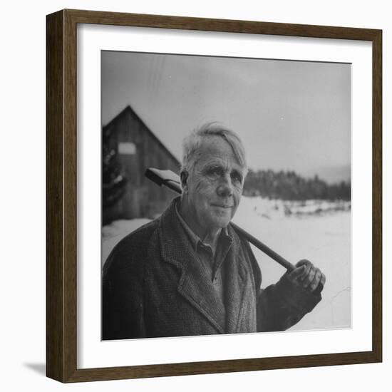 Poet Robert Frost in Affable Portrait, Axe Slung over Shoulder in Wintry Rural Setting-Eric Schaal-Framed Premium Photographic Print