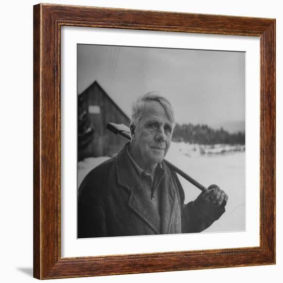 Poet Robert Frost in Affable Portrait, Axe Slung over Shoulder in Wintry Rural Setting-Eric Schaal-Framed Premium Photographic Print