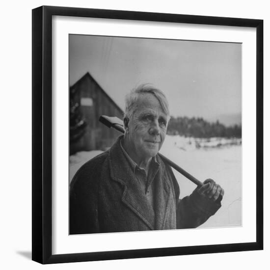 Poet Robert Frost in Affable Portrait, Axe Slung over Shoulder in Wintry Rural Setting-Eric Schaal-Framed Premium Photographic Print