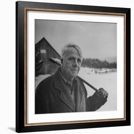 Poet Robert Frost in Affable Portrait, Axe Slung over Shoulder in Wintry Rural Setting-Eric Schaal-Framed Premium Photographic Print