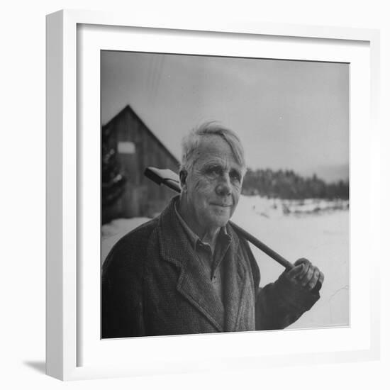 Poet Robert Frost in Affable Portrait, Axe Slung over Shoulder in Wintry Rural Setting-Eric Schaal-Framed Premium Photographic Print