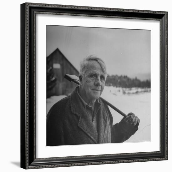 Poet Robert Frost in Affable Portrait, Axe Slung over Shoulder in Wintry Rural Setting-Eric Schaal-Framed Premium Photographic Print