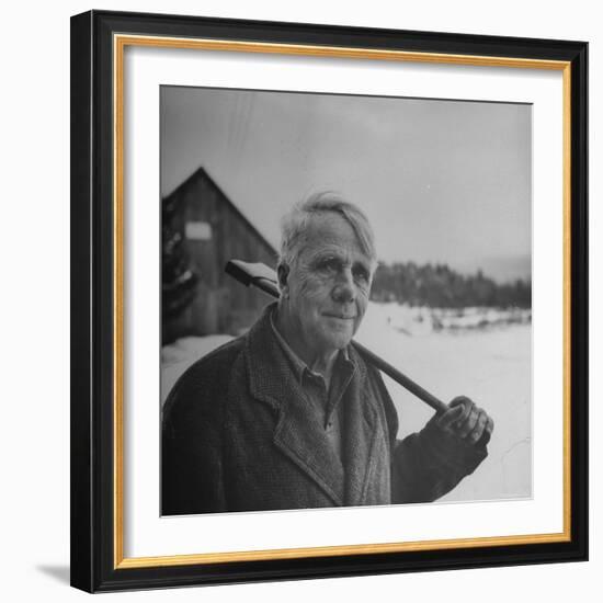 Poet Robert Frost in Affable Portrait, Axe Slung over Shoulder in Wintry Rural Setting-Eric Schaal-Framed Premium Photographic Print