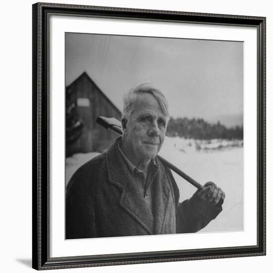 Poet Robert Frost in Affable Portrait, Axe Slung over Shoulder in Wintry Rural Setting-Eric Schaal-Framed Premium Photographic Print