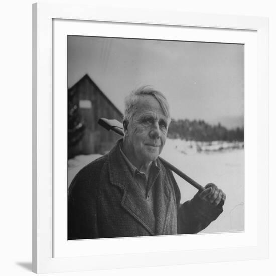 Poet Robert Frost in Affable Portrait, Axe Slung over Shoulder in Wintry Rural Setting-Eric Schaal-Framed Premium Photographic Print