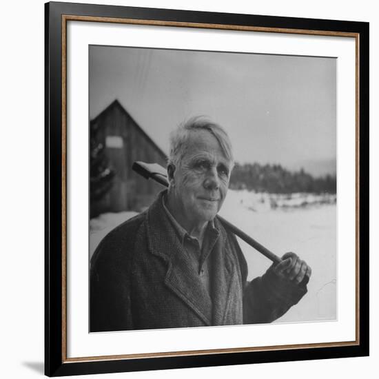 Poet Robert Frost in Affable Portrait, Axe Slung over Shoulder in Wintry Rural Setting-Eric Schaal-Framed Premium Photographic Print