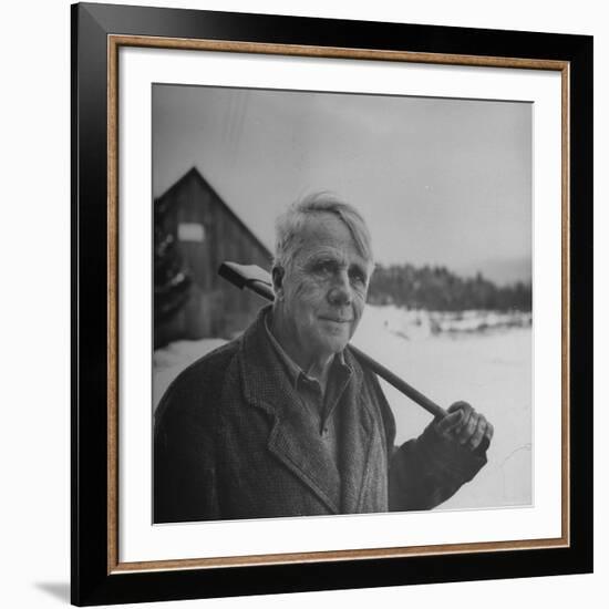 Poet Robert Frost in Affable Portrait, Axe Slung over Shoulder in Wintry Rural Setting-Eric Schaal-Framed Premium Photographic Print