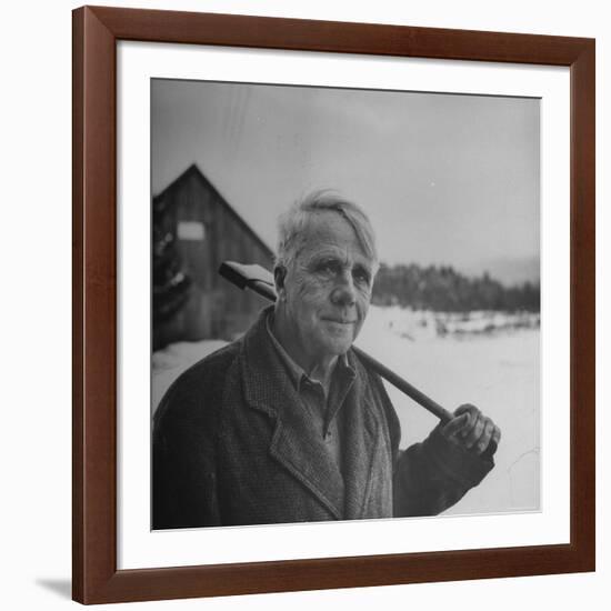 Poet Robert Frost in Affable Portrait, Axe Slung over Shoulder in Wintry Rural Setting-Eric Schaal-Framed Premium Photographic Print