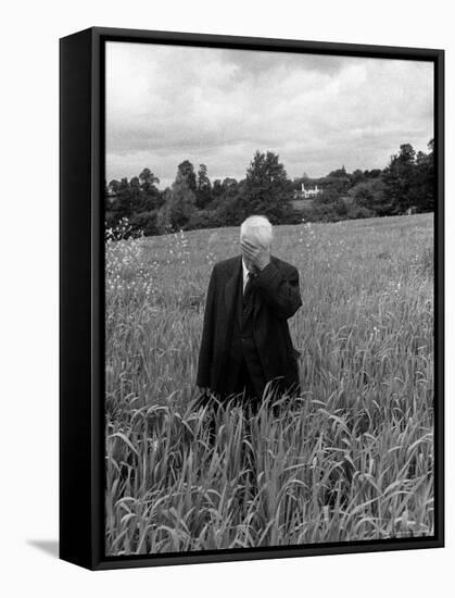 Poet Robert Frost Standing in Oxford Field with His Hand over His Face-Howard Sochurek-Framed Premier Image Canvas