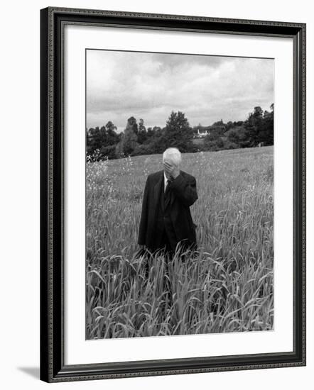 Poet Robert Frost Standing in Oxford Field with His Hand over His Face-Howard Sochurek-Framed Premium Photographic Print