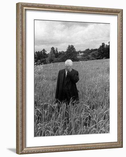 Poet Robert Frost Standing in Oxford Field with His Hand over His Face-Howard Sochurek-Framed Premium Photographic Print